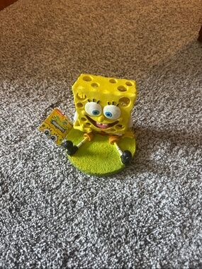SpongeBob SquarePants Bright Yellow Figurine on Green Base